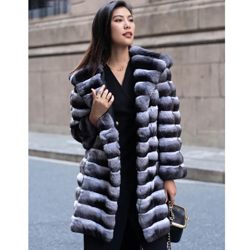 Women's zebra stripe faux fur overcoat with a 65cm medium length on a hanger