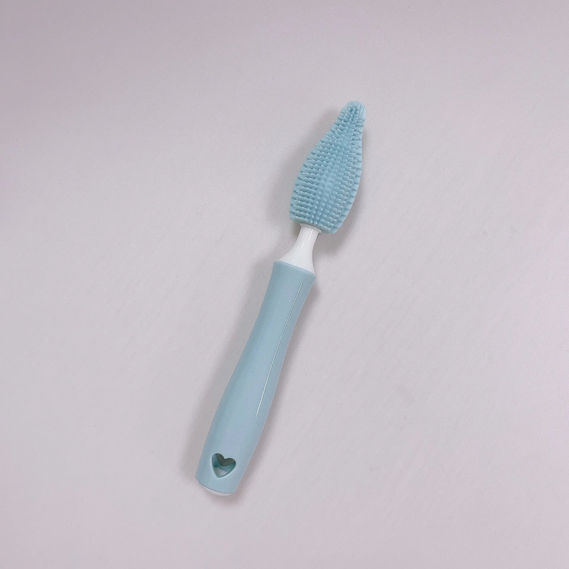 Baby silicone bottle brush set in pink, blue, and yellow for cleaning straws and nipples
