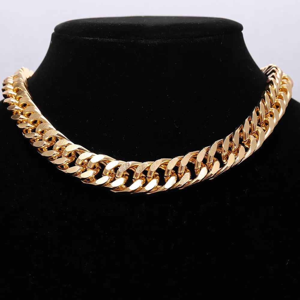 Gold-colour thick chain women's necklace with a 6cm component on a 32cm chain.