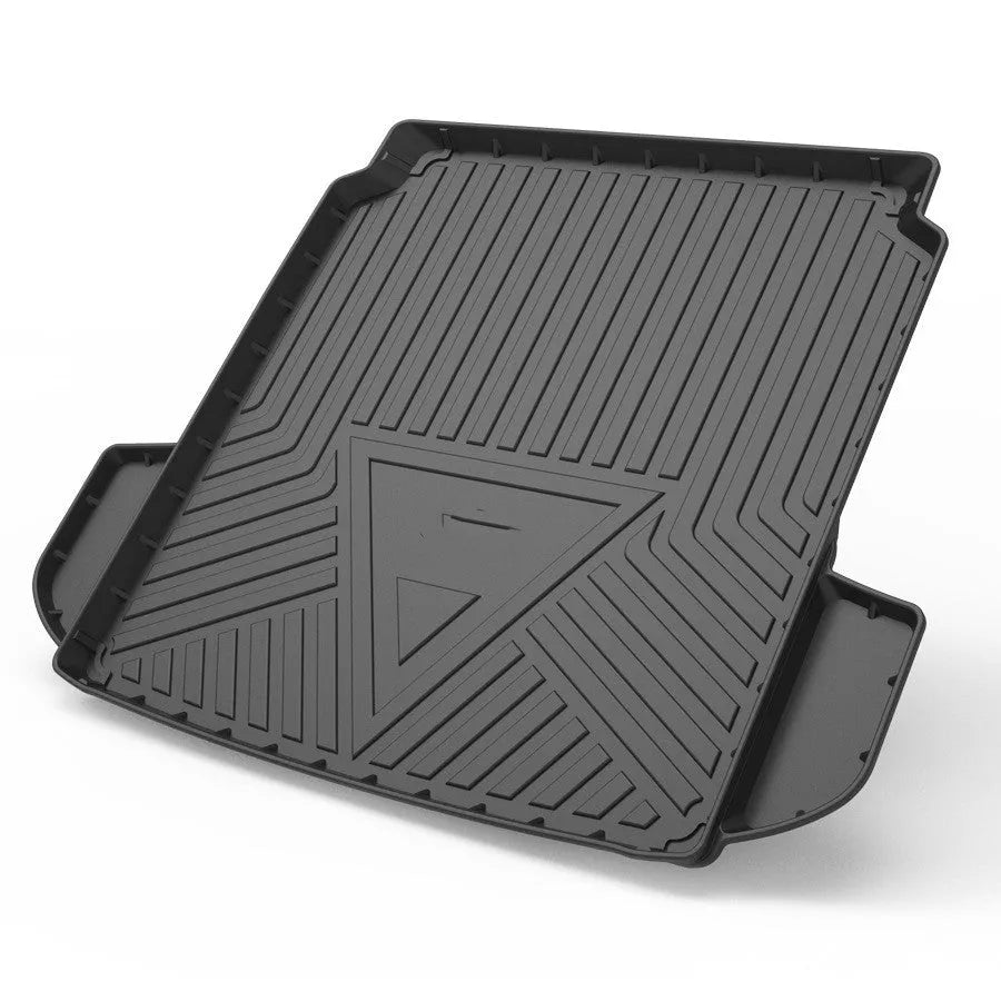 Black carbon fibre pattern TPE car boot liner mat for vehicle cargo protection.