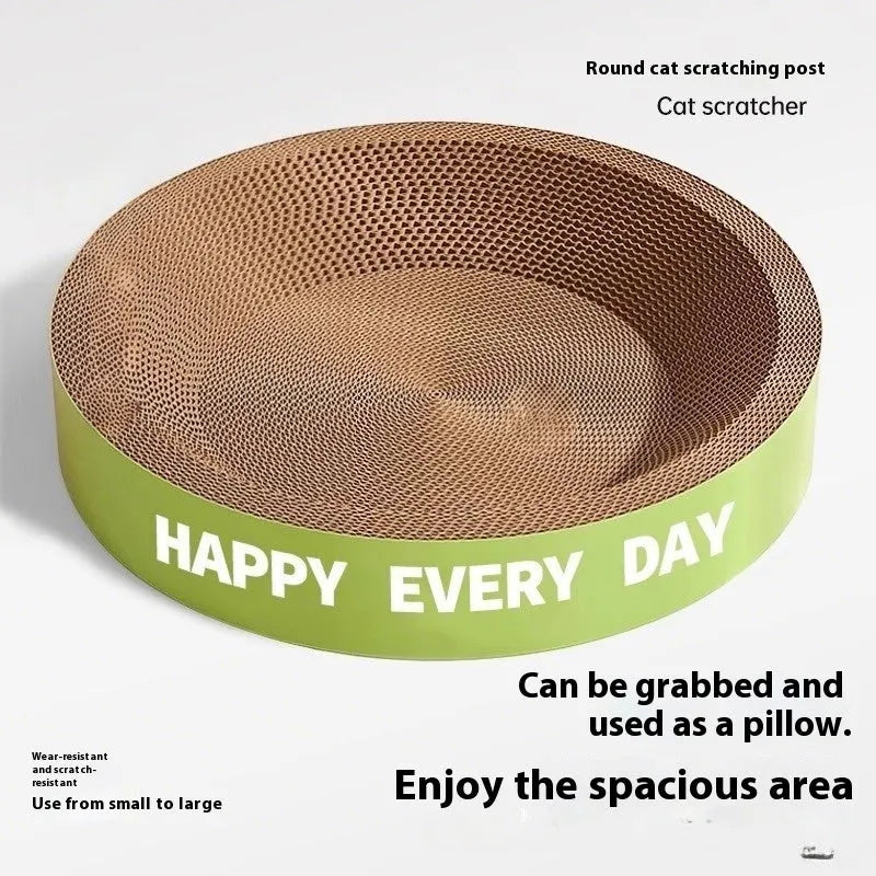 Green round cat scratching board nest bed on a floor