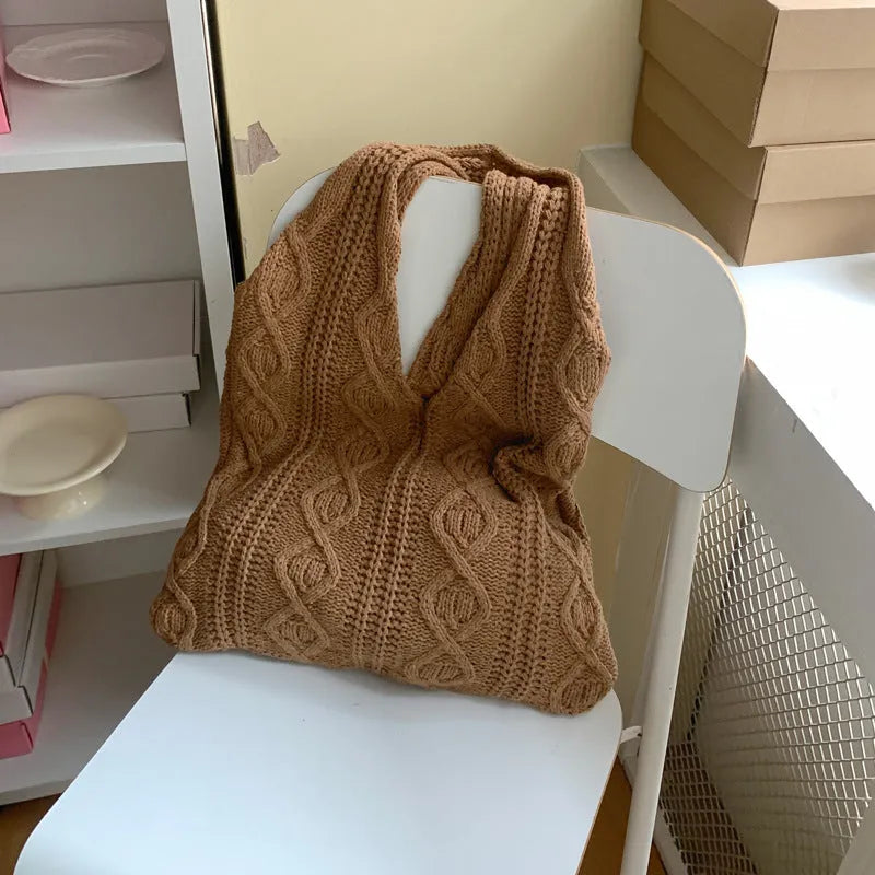 Large retro hollow knitted women's shoulder tote bag in a solid colour with double straps.