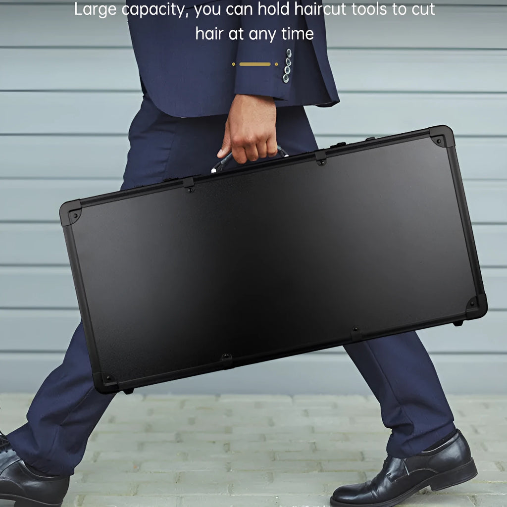 Black hard-shell PVC suitcase for storing hair styling tools like hairdryers and straighteners.