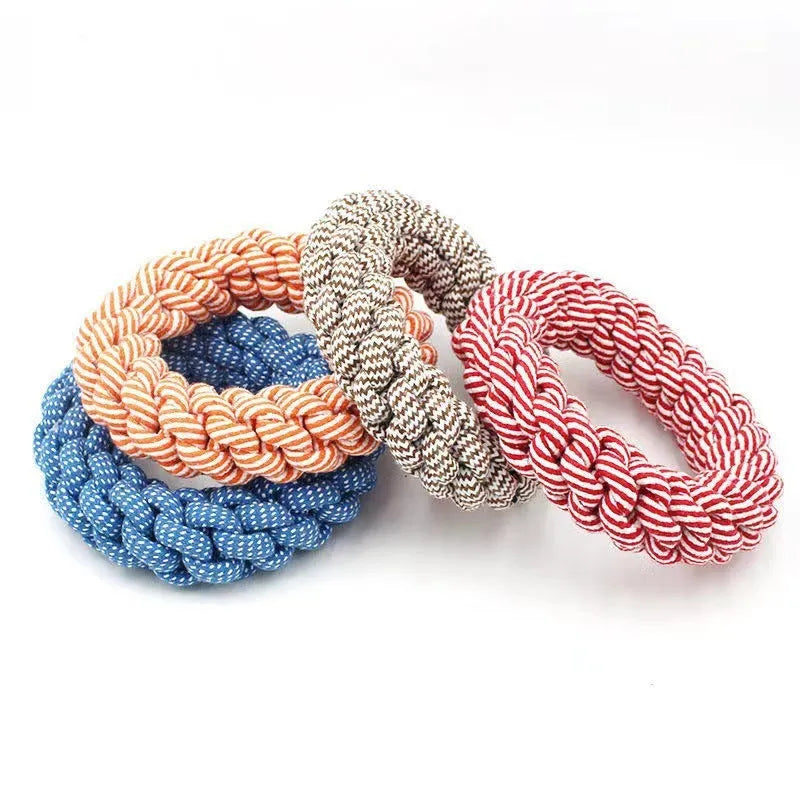 Cotton braided ring dog toy approximately 18cm in circumference with textured knot design