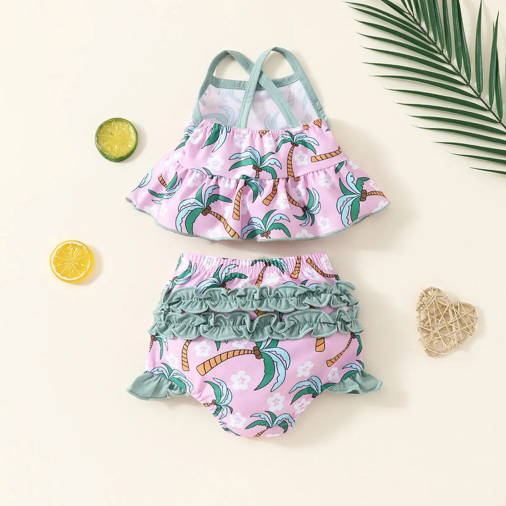 White children's two-piece swimsuit set with shirt and shorts for toddlers.