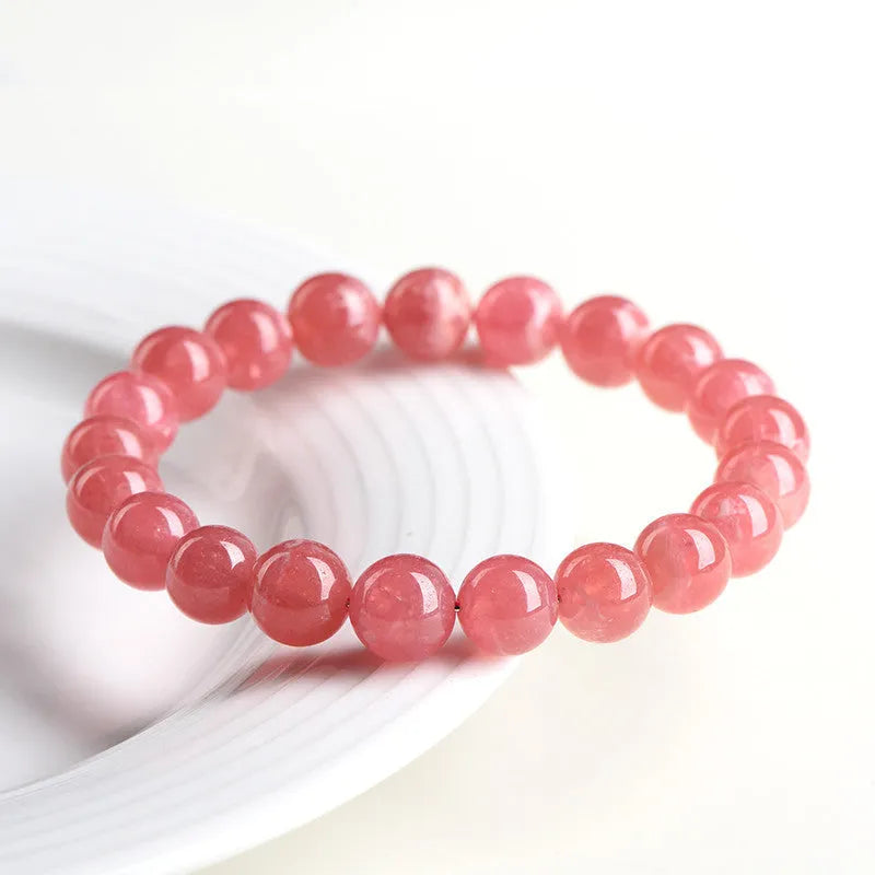 Geometric red rhodochrosite crystal bracelet for women with a Longevity Lock clasp.