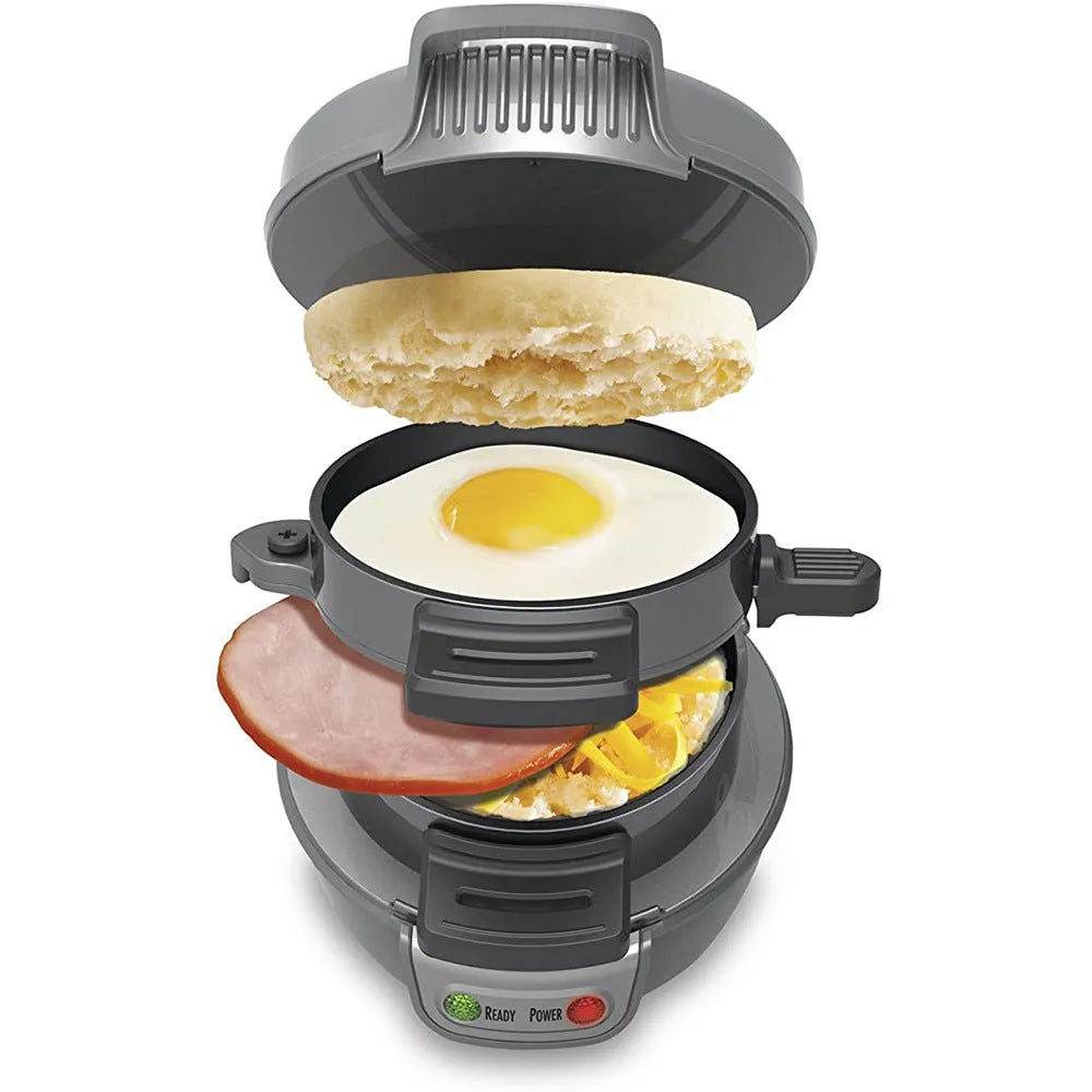 Bright red household breakfast machine with sandwich plates and egg cooker ring on countertop