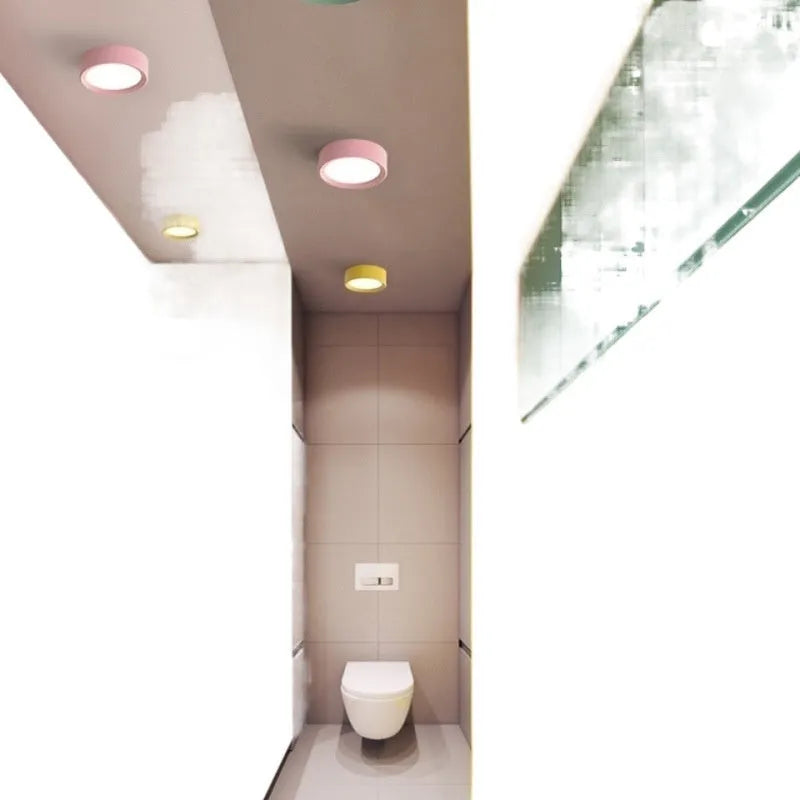 Ultra-thin surface mounted LED downlight in a choice of coloured aluminium shells.