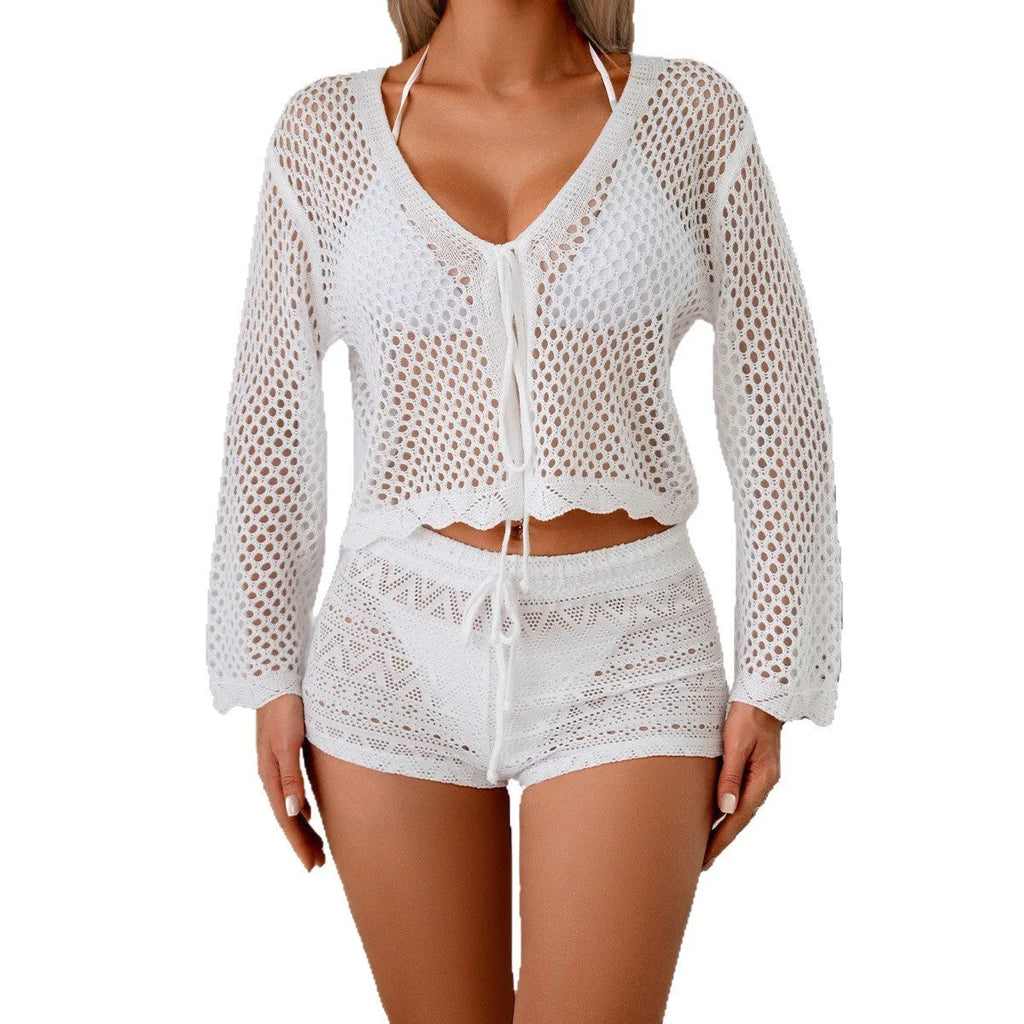 Short women's cardigan blouse with bell sleeves in hollow woven fabric, shown in black colour