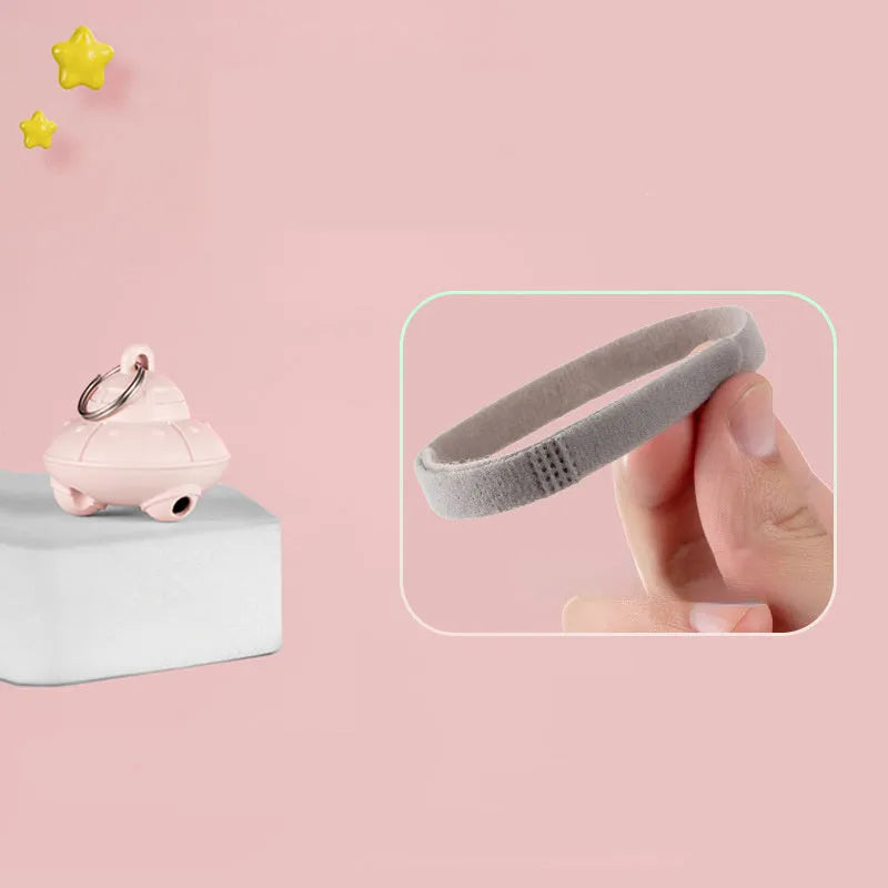 Green cat collar laser toy showing USB charging port and rotating mechanism