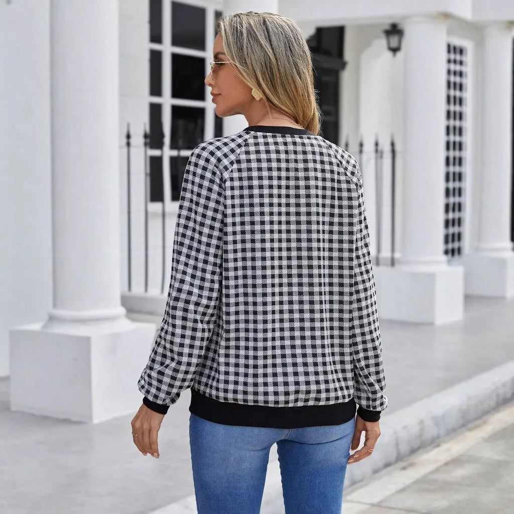 Black Japanese plaid pullover sweater with printed stripe patterns and long sleeves