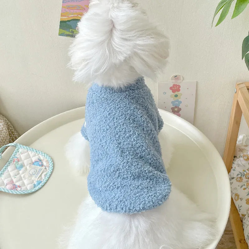A dog wearing a double-sided cloud velvet thickened jacket in one of six available colours.