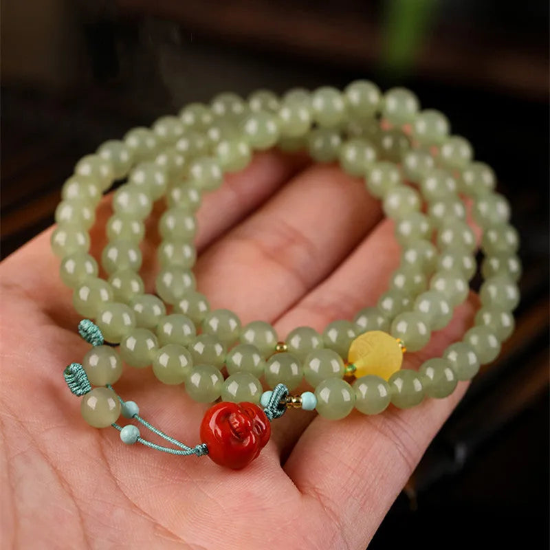 Pale blue Hetian jade bracelet with 6mm beads in three-circle traditional design