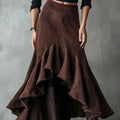 Western brown high-low maxi skirt with ruffled ankle hem laid flat.