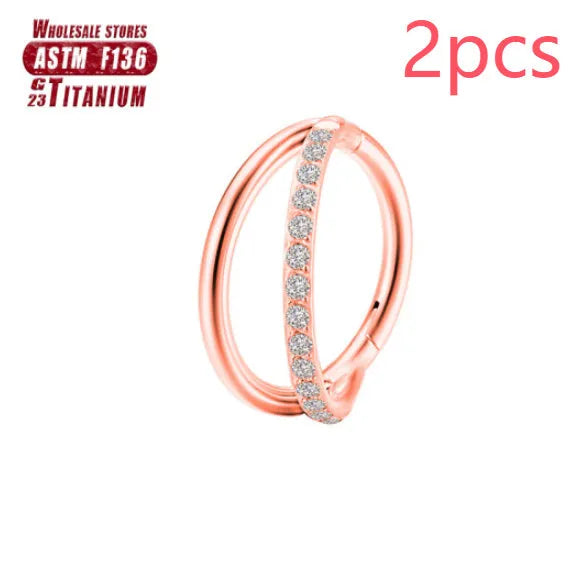 F136 titanium alloy nose ring in silver, gold, black, rose gold, and colourful finishes showing 1.2mm gauge.