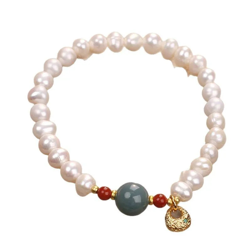 White freshwater pearl and aquamarine bracelet with opal centrepiece, ethnic style