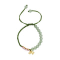 Hand woven red rope bracelet with floral design elements in Lily Carrying Strap colour