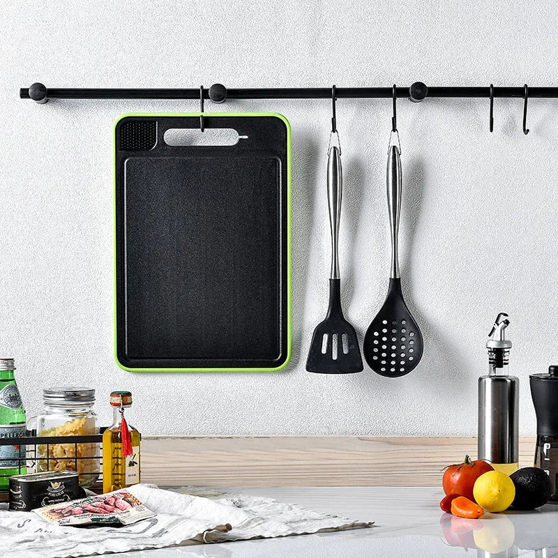 Grey square aluminium cutting board with double sides, integrated knife sharpener and grinding surface