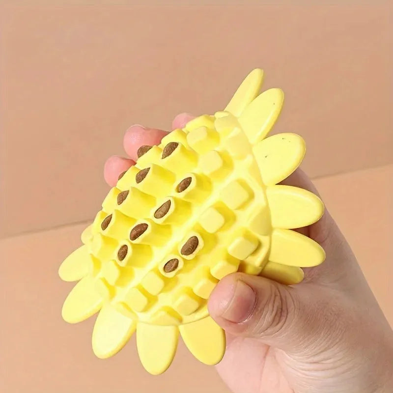 Yellow rubber sunflower-shaped dog toy for teething puppies and chewing play