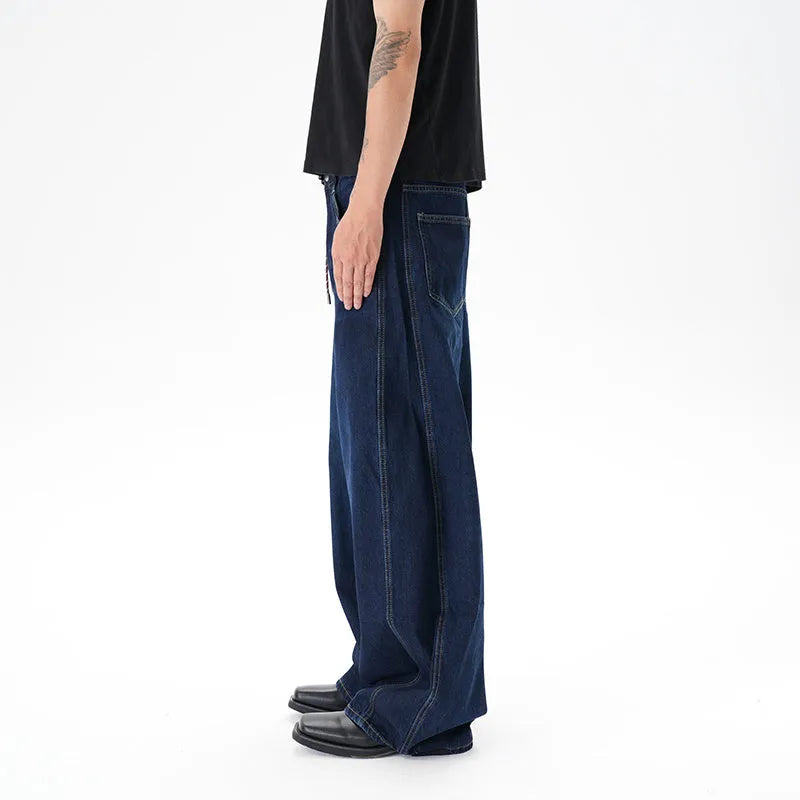 Dark blue women's wide-leg denim jeans with distressed detailing on the legs.