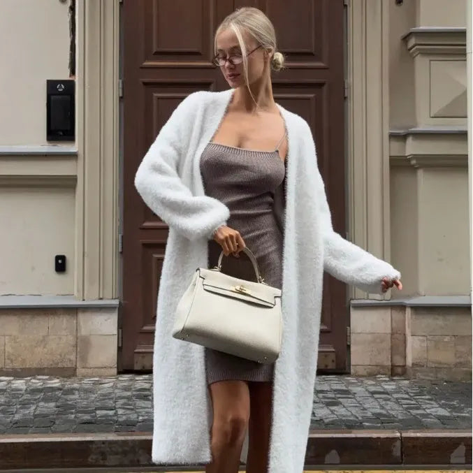 White long knitted cardigan jacket with loose fit and extended length