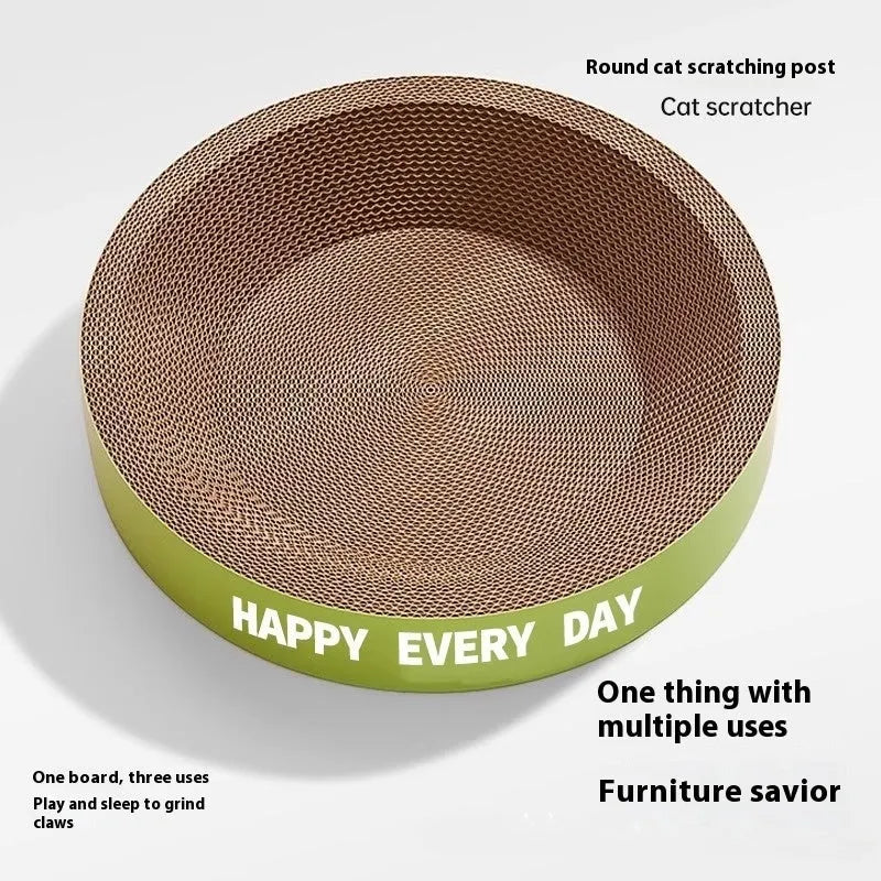 Green round cat scratching board nest bed on a floor