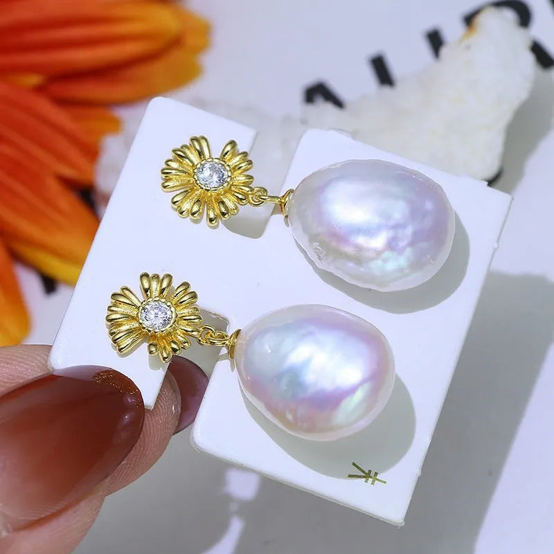 Baroque floral sterling silver earrings with ring holder function in silver and gold plating options.
