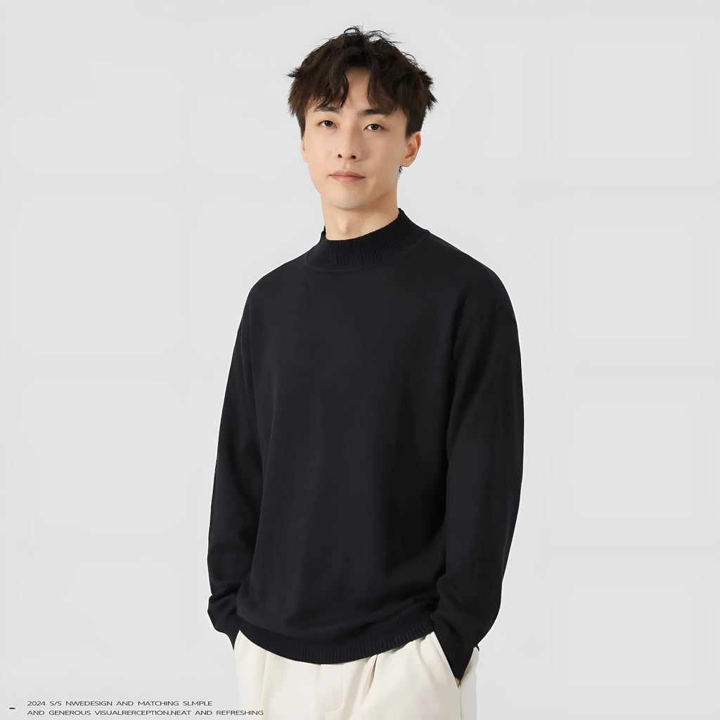 Men's loose fit long sleeve pullover sweater in a neutral colour on a hanger