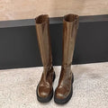 Women's black long tube knight boots with round toe and chunky rubber sole