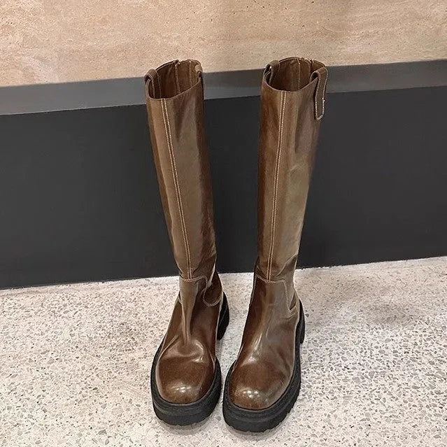 Women's black long tube knight boots with round toe and chunky rubber sole