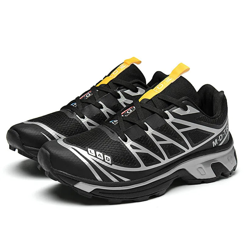 Low-top lace-up hiking shoe in khaki with a rubber sole and mesh lining detail.