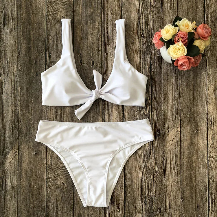 Women's two-piece bikini set in solid colour with bra top and matching panties