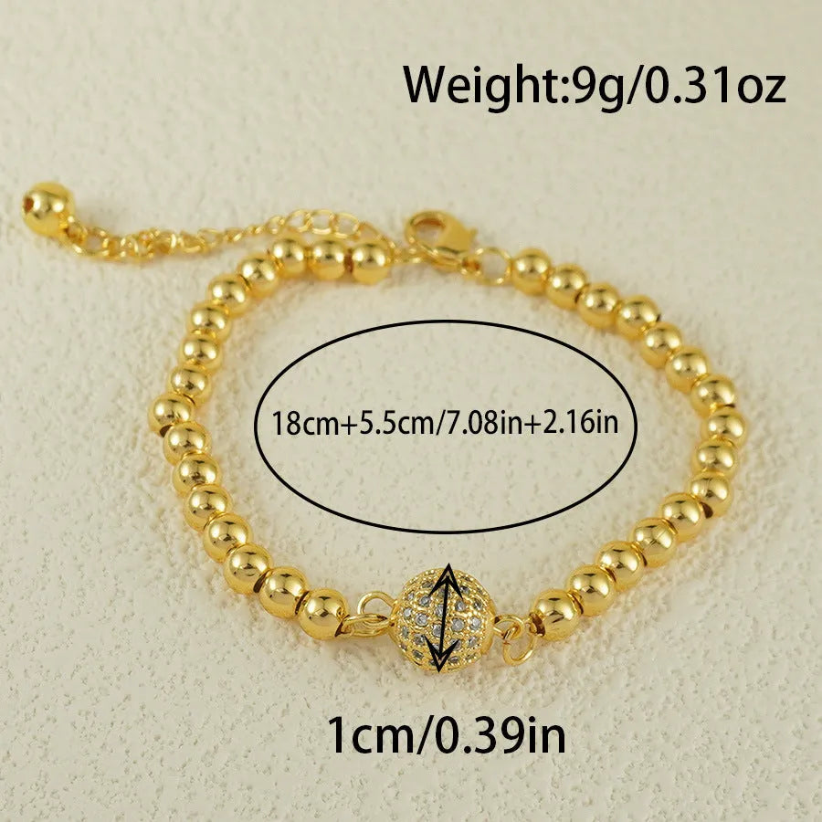Copper heart-shaped bracelet with a single zircon stone in an Arabic style.