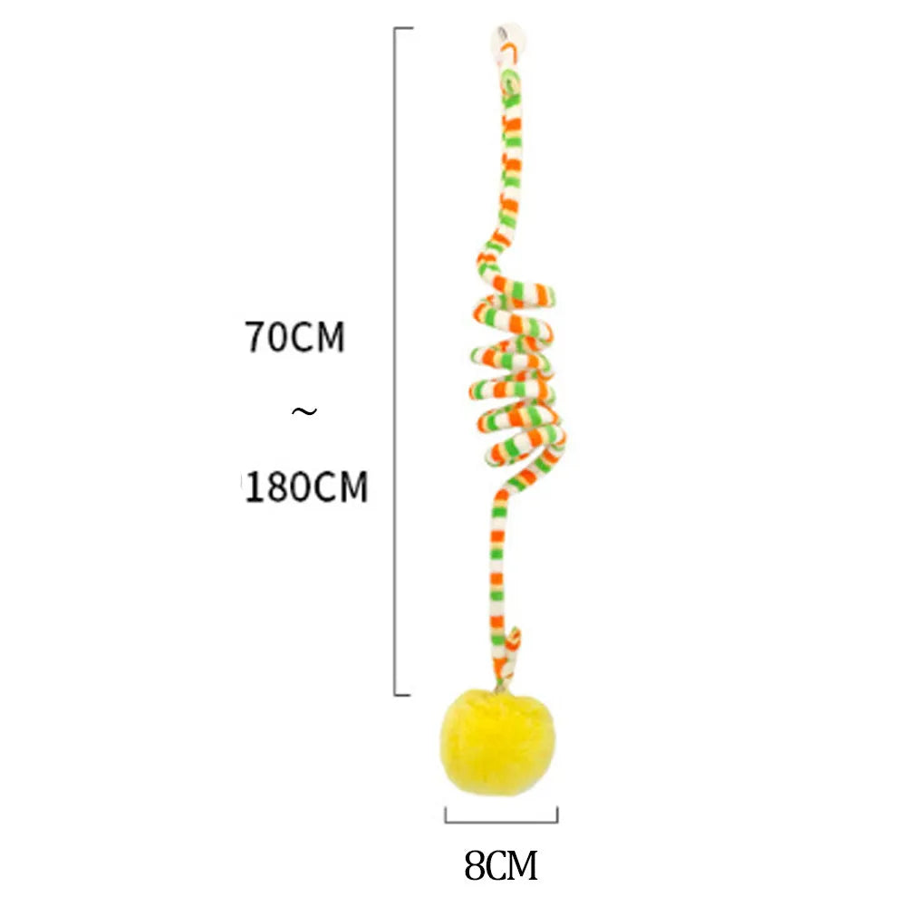 Inflatable ball cat toy with bell stick on a spring, hanging from a door via a suction cup.