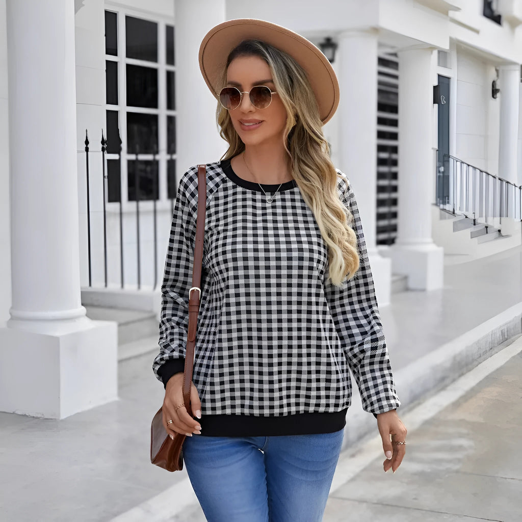 Black Japanese plaid pullover sweater with printed stripe patterns and long sleeves