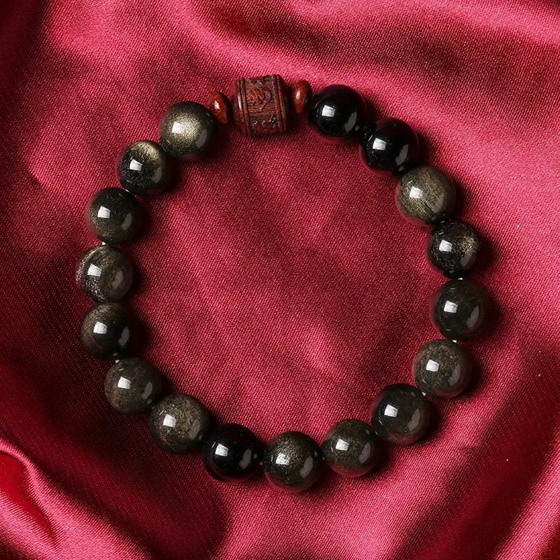 Hand-woven golden obsidian bracelet with 10mm round beads in a vintage style.