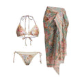 Creamy white floral print women's bikini set with attached skirt, showing top, briefs, and skirt components