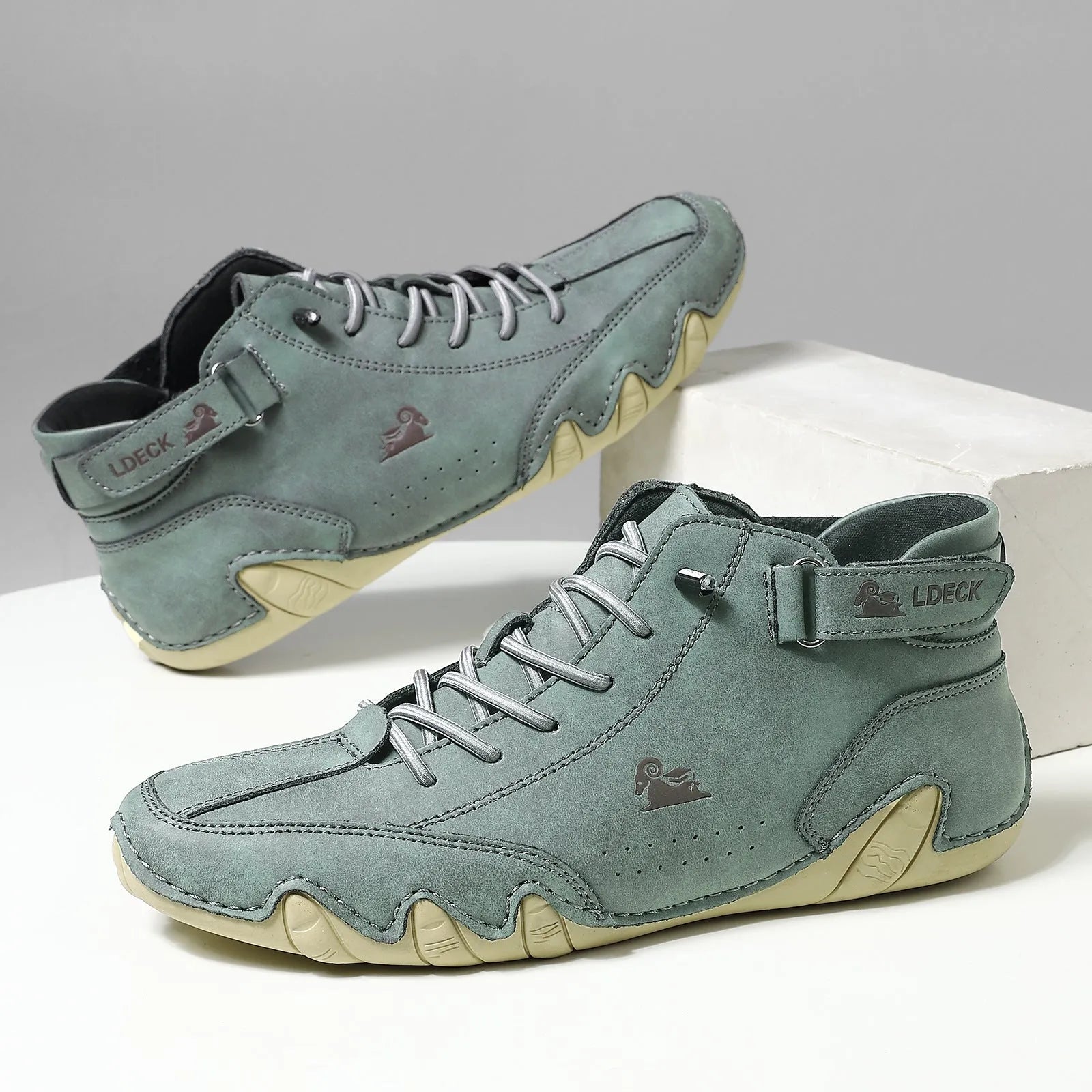 Men's khaki high-top casual shoes with a microfiber upper and a flat rubber sole.
