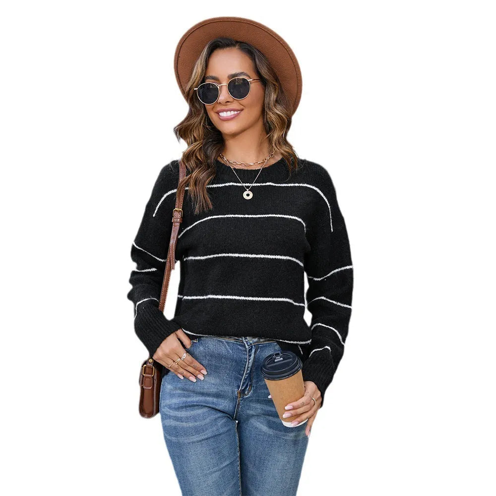 Women's black and white striped pullover sweater with round neck and loose fit street fashion style