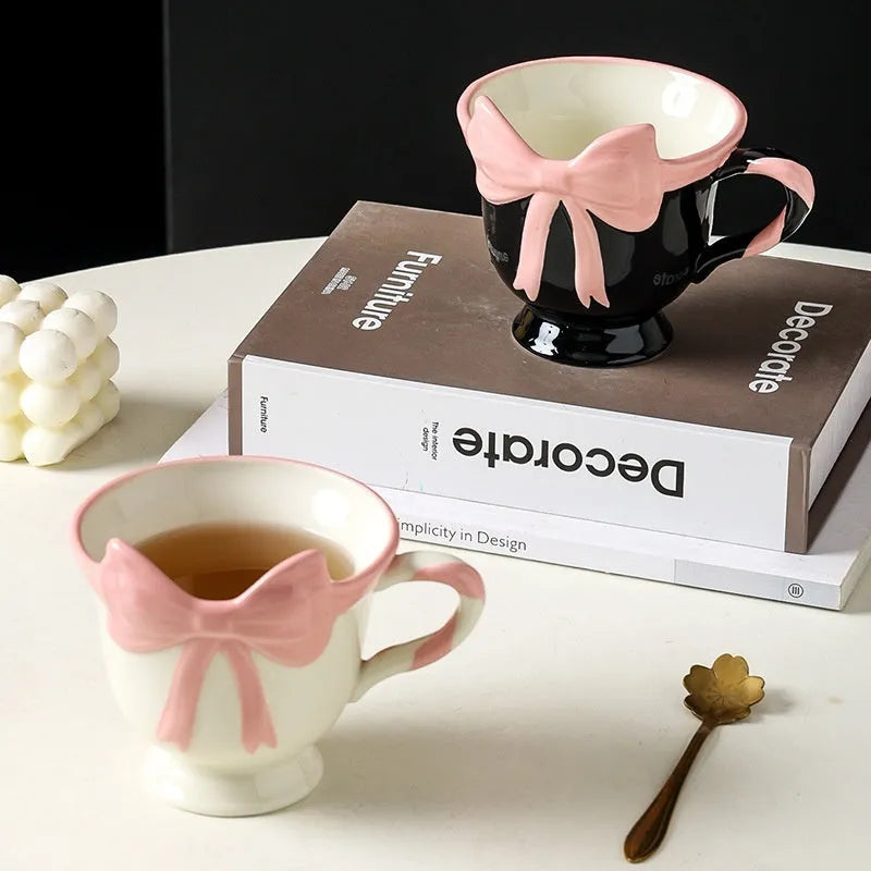 Original heart bow design ceramic mug in black pink or white powder colour, 350ml capacity.