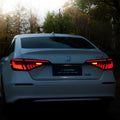 Black and red LED taillight assembly for 11th Generation Honda Civic with streamer indicators.