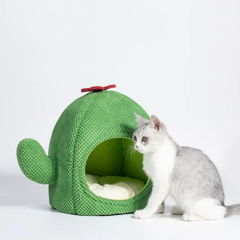 Green cactus-shaped enclosed cat bed for indoor pet sleeping