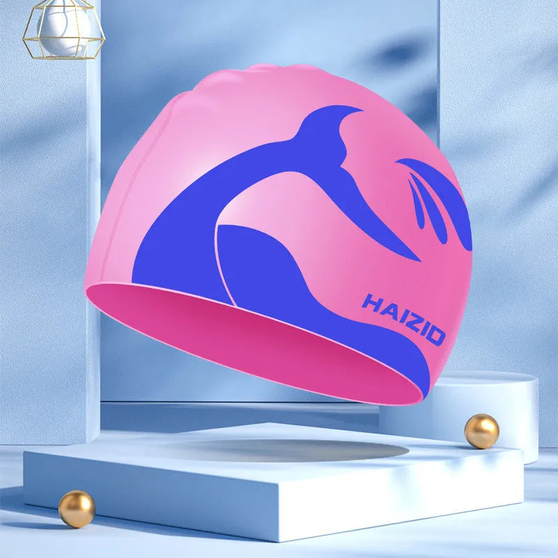 Silicone swimming cap with whale tail design and waterproof ear protectors in four colour options