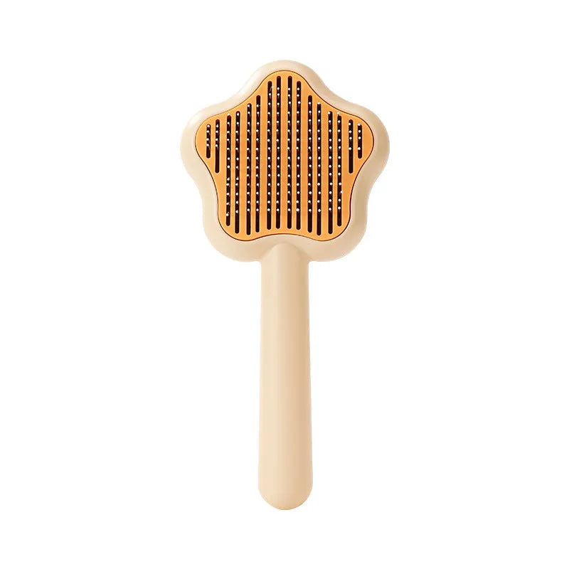 Green or yellow handheld self-cleaning magic wand pet comb with stainless steel needles.