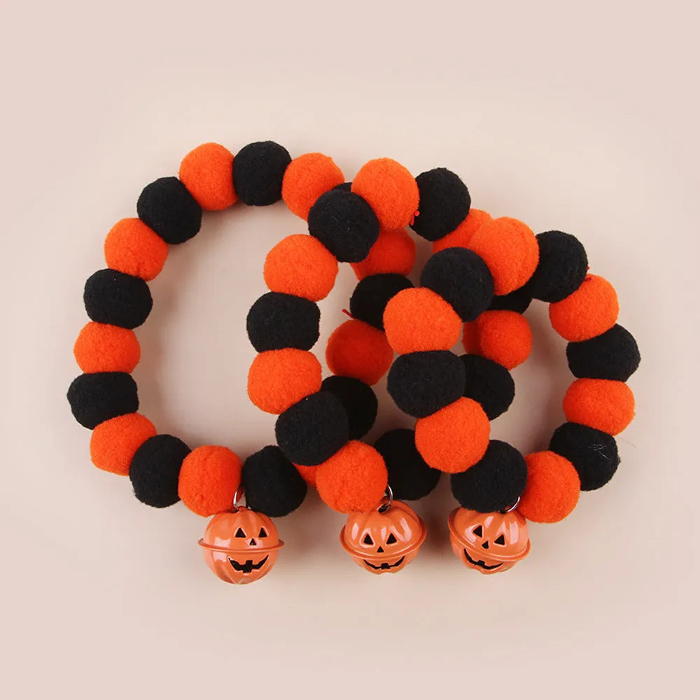 Halloween cat collar with naughty pumpkin design on adjustable nylon webbing in three sizes