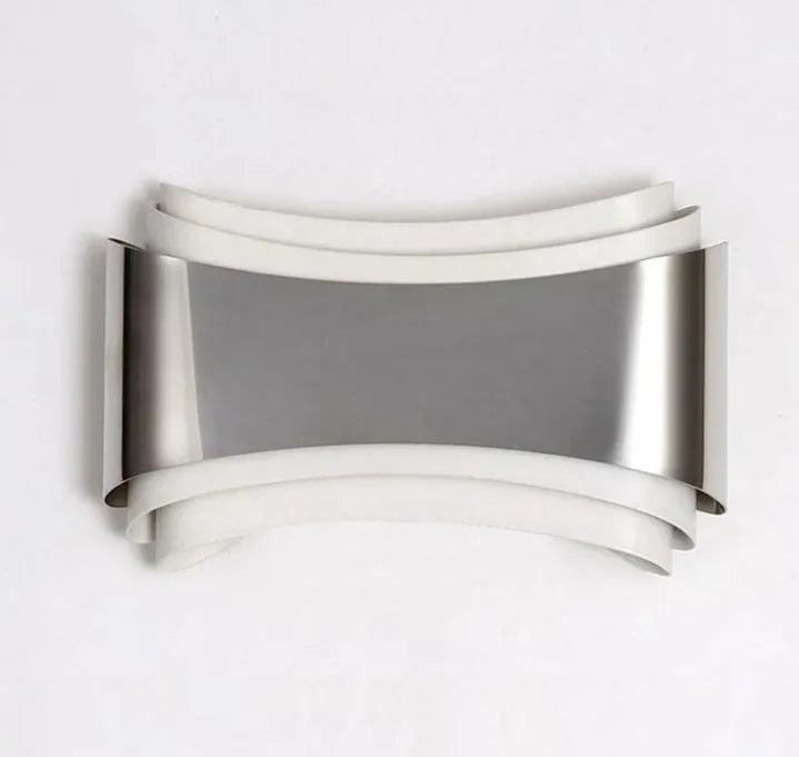Simple modern warm white LED wall lamp with matte finish and compact rectangular design.