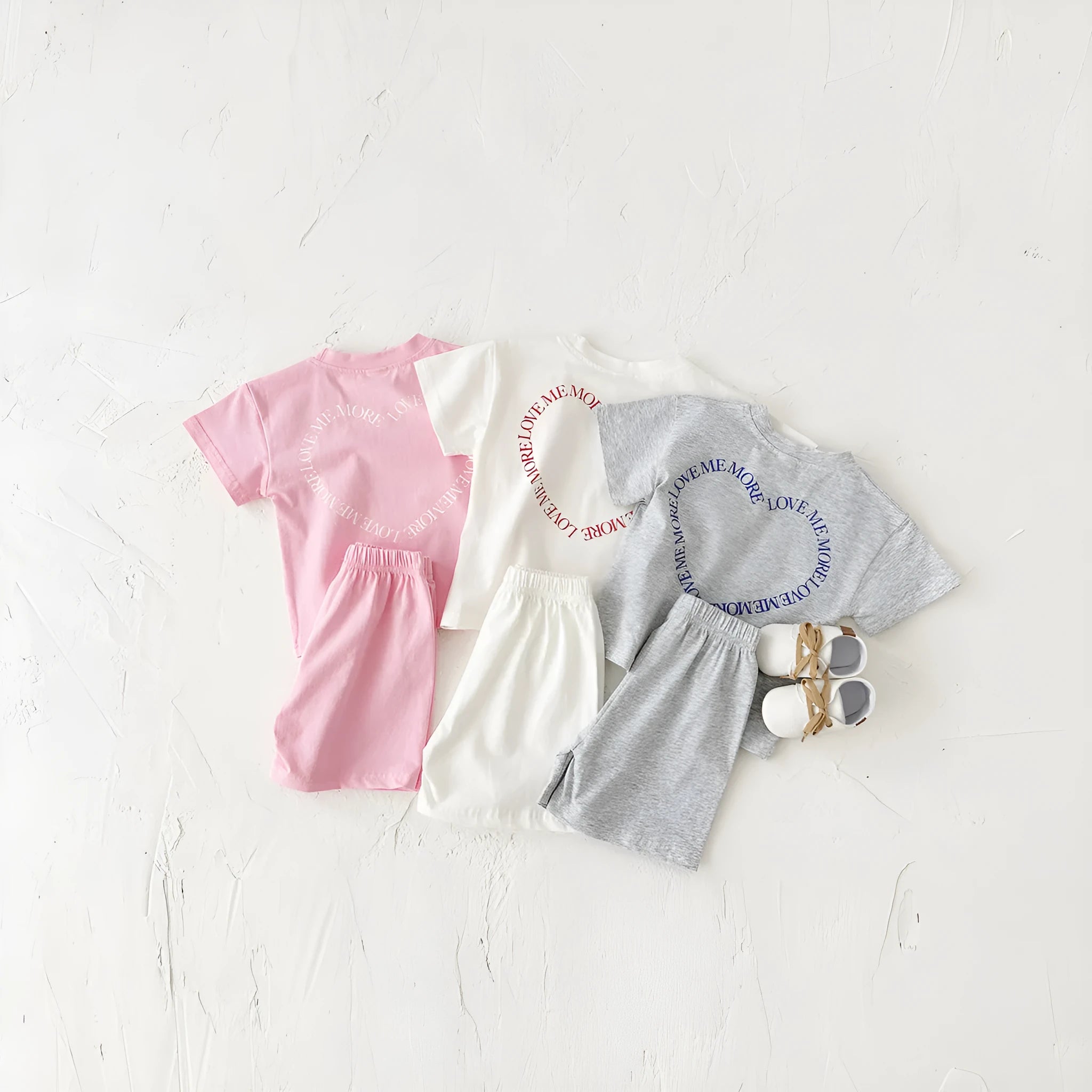 Korean style baby cotton two-piece suit set with heart printing and plaid pattern, shown in grey.
