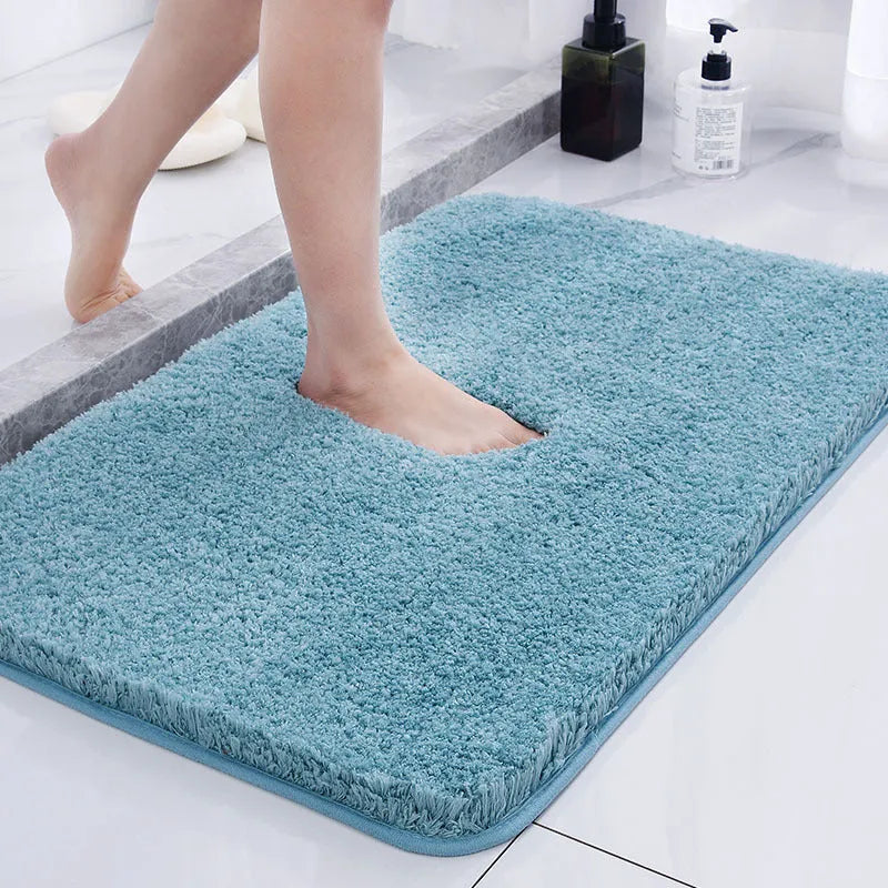 Absorbent plush square bathroom mat in dark gray, machine washable non-slip polyester floor carpet