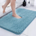Absorbent plush square bathroom mat in dark gray, machine washable non-slip polyester floor carpet