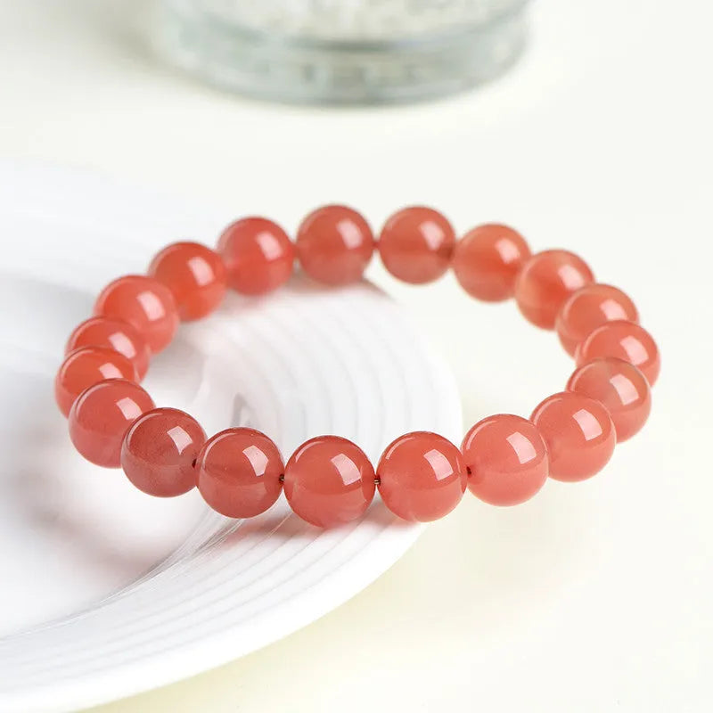 Natural south cherry red agate bracelet showing single and triple strand design options with different bead sizes.